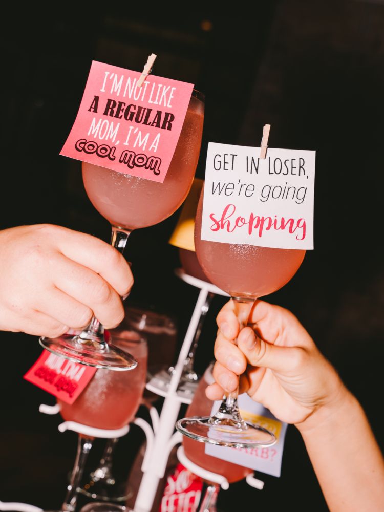 cheers with with mean girl cocktails at revolutions bars