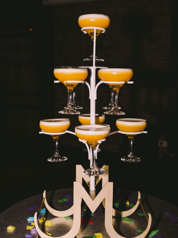 a cocktail tree with pornstar martini cocktails at revolutions bars