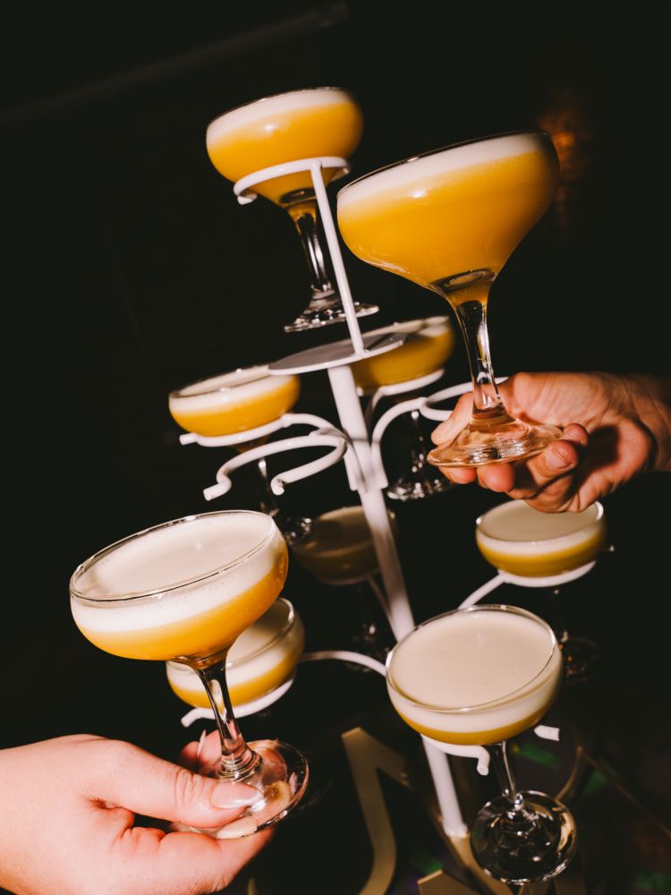 a cocktail tree with pornstar martini cocktails at revolutions bars