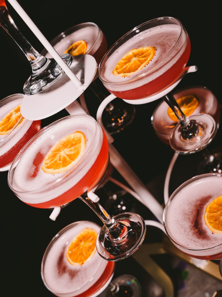 a cocktail tree with cosmo cocktails at revolutions bars