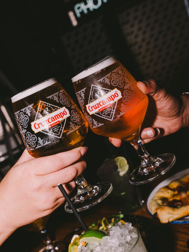 cheers with beers at bottomless drinks with food experience at revolution bars