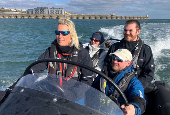 people in a powerboat on a powerboat two day training course in brighton