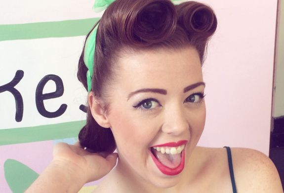 woman styled for a vintage makeover with hair and make-up