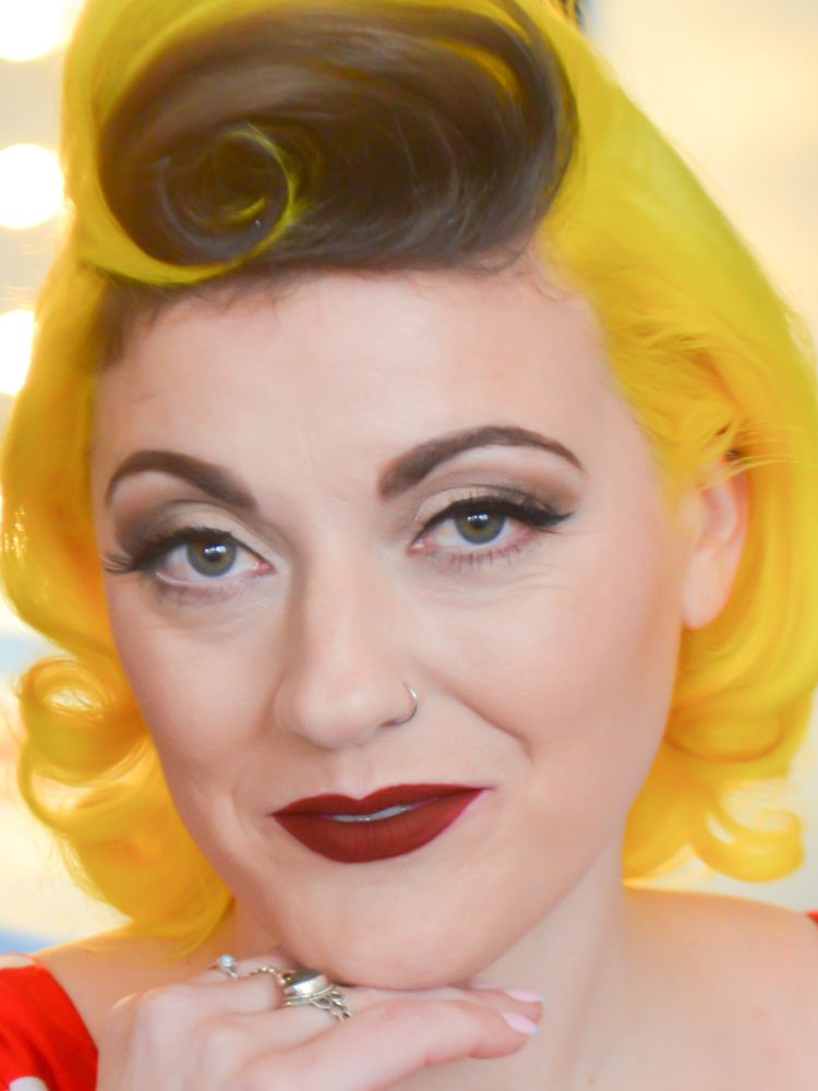 woman styled for a vintage makeover with hair and make-up