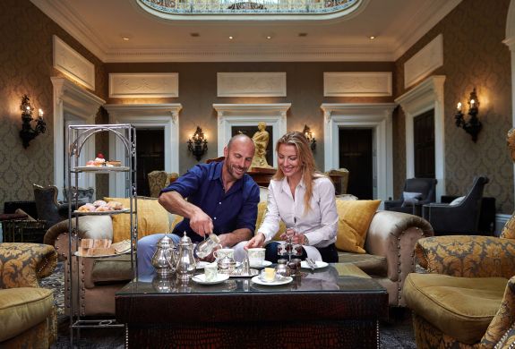 couple having afternoon tea at oulton hall hotel in yorkshire