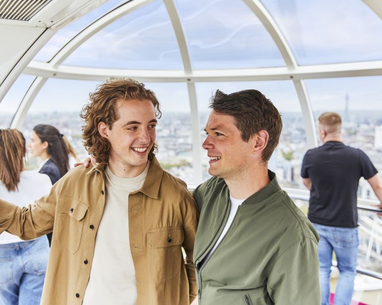 Couple looking at view from london eye