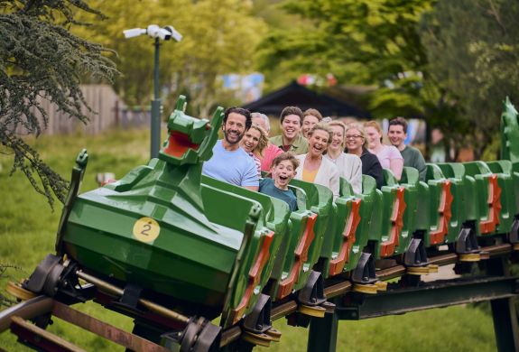 people on rollercoaster ride at legoland