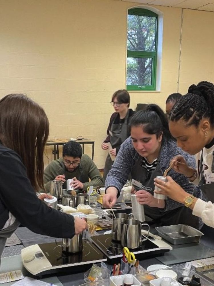 Heating wax at candle making workshop
