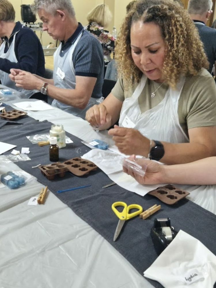 People at candle making workshop