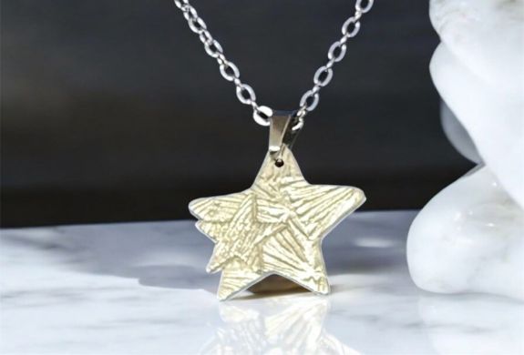 Star pendant necklace made from silver clay