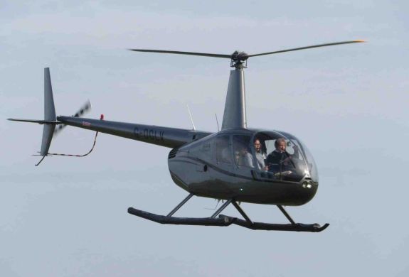 black helicopter in the sky