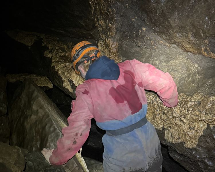 A man at the how stean caving experience
