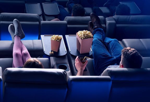 couple sitting in luxe seats at an odeon cinema