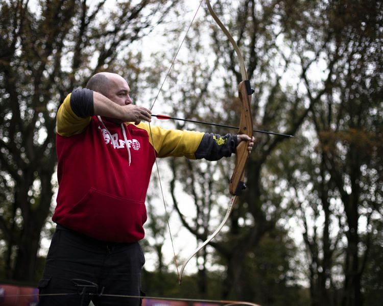 man on archery experience