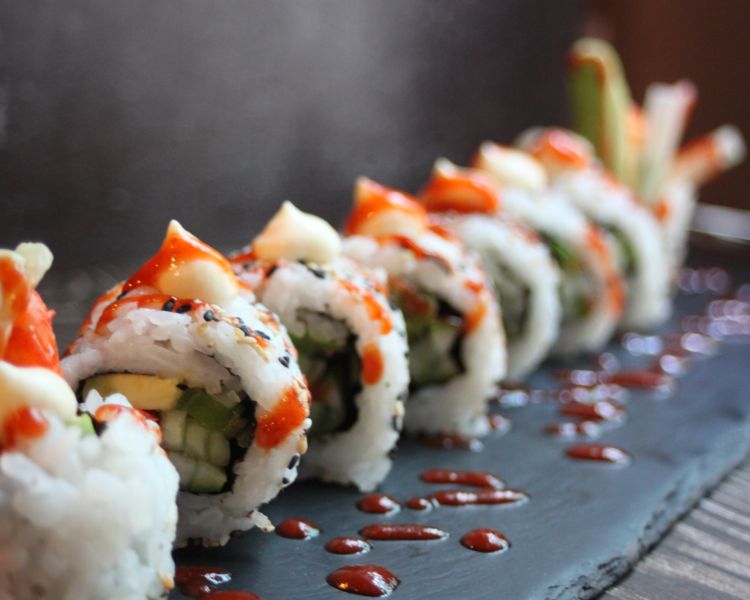 a sushi roll at inamo london for an unlimited sushi dining experience