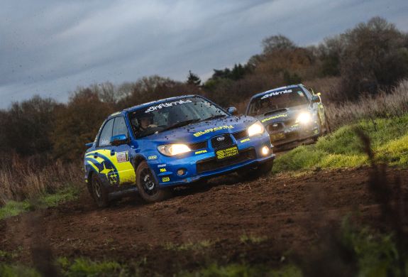 two subaru impreza's on a dirt track for a rally driving experience day