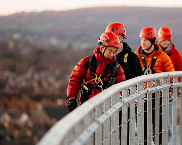 group walking along stadium walk at zip world cardiff