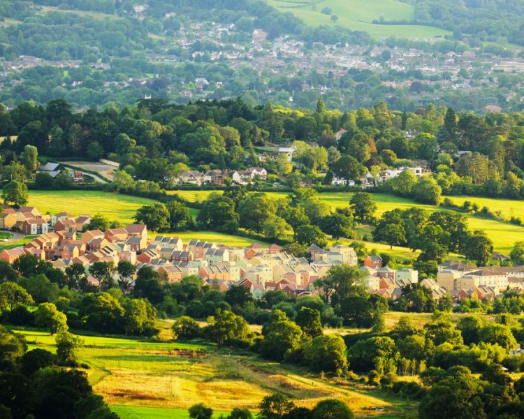 villages in the cotswolds seen from above on a helicopter ride