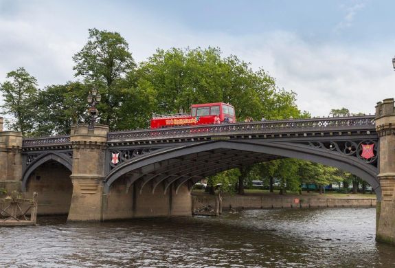 York bridge over river sightseeing open top bus