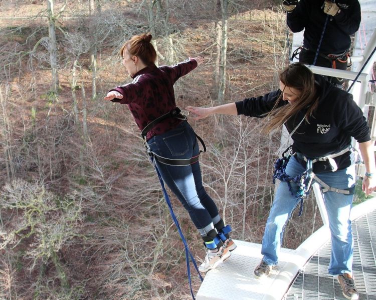 girl about to bungee jump off the platform on a bungee jump experience day