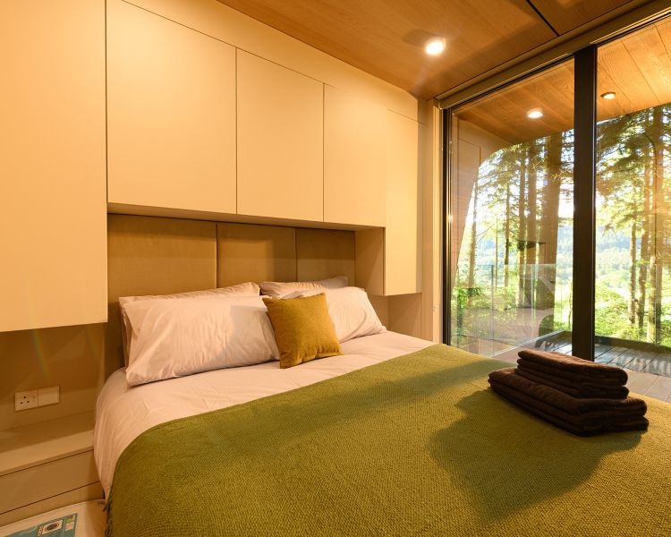 Double bedroom in forest lodge