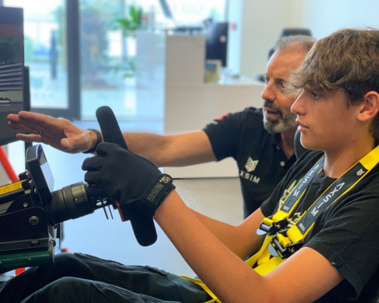 A boy and instructor driver training