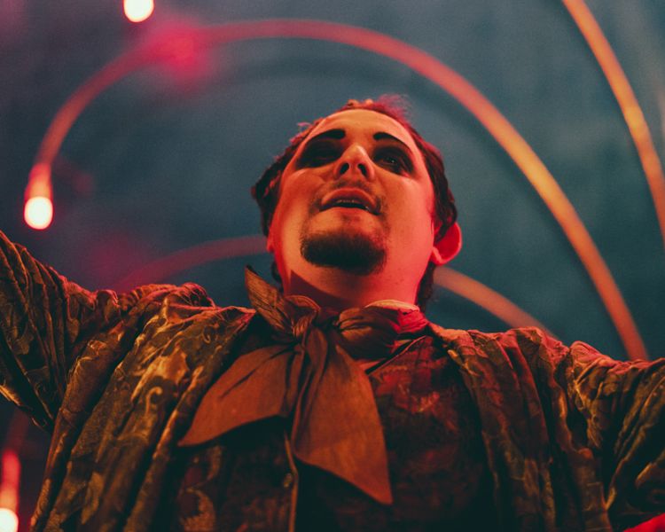 actor in costume at chat noir immersive show and dining experience in london