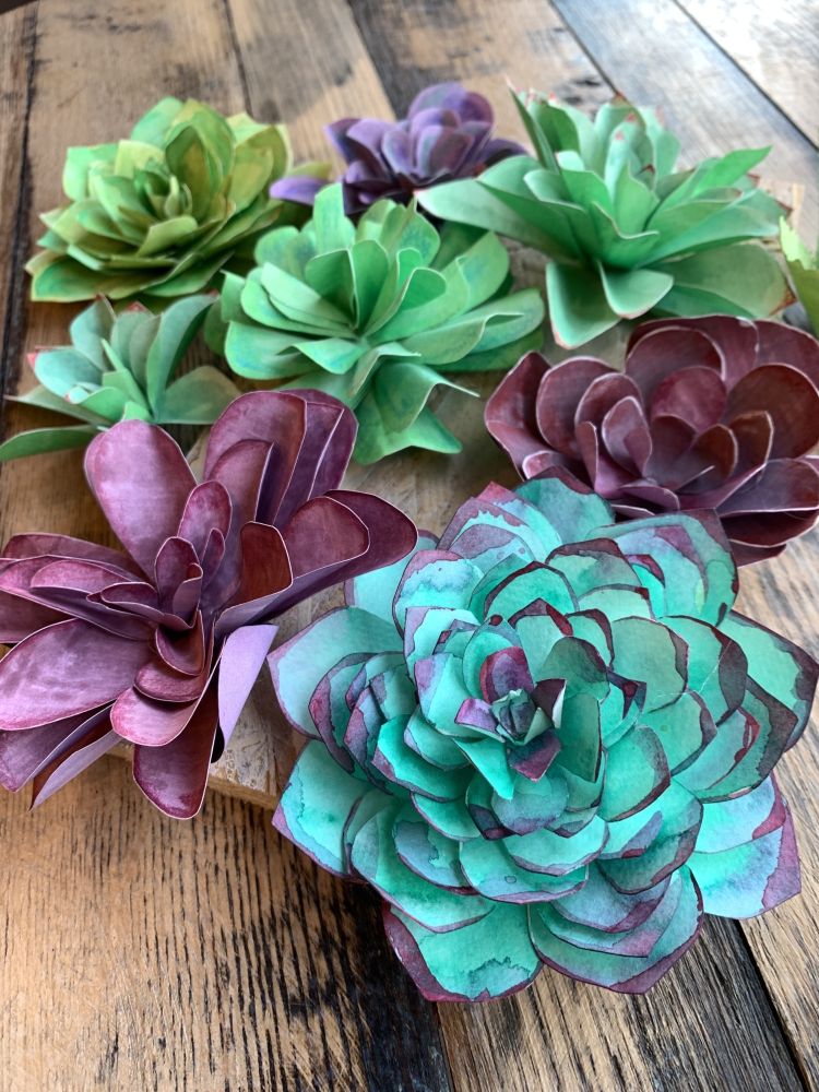flowers made out of coloured paper on a craft workshop
