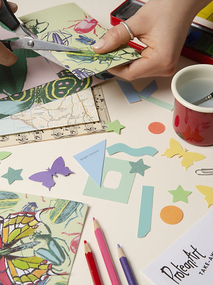 cutting up patterned paper on a sketchbook and journaling experience