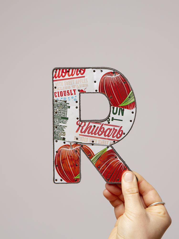 the letter r made from recycled drinks cans