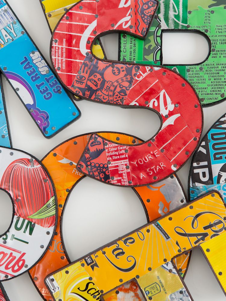 metal letters made from recycled drinks cans