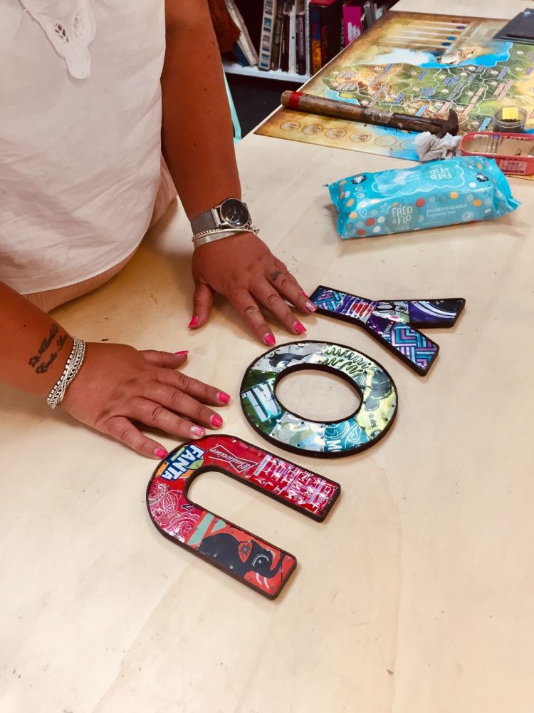 metal letters spelling you made from recycled drinks cans