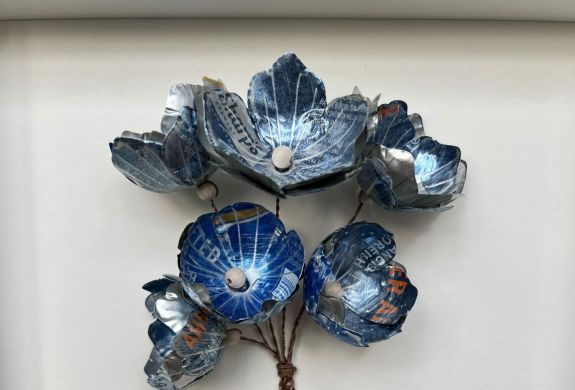 flowers made from cut up metal drinks cans