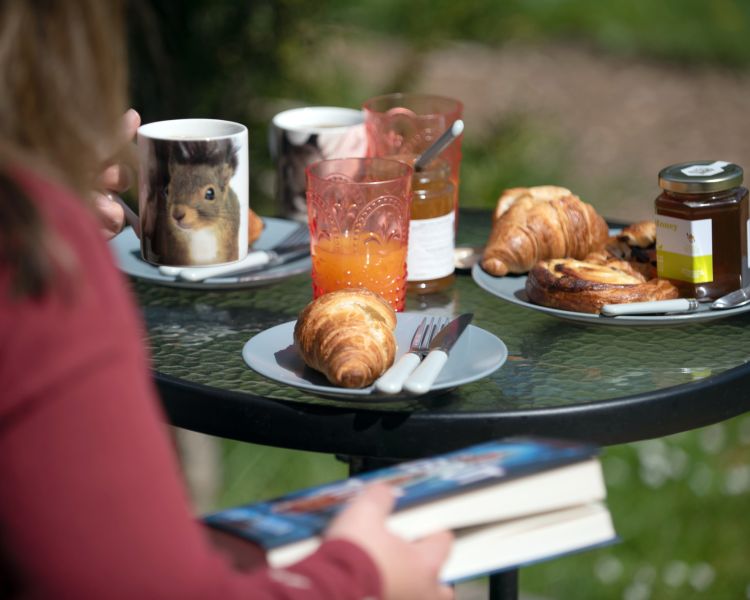 breakfast laid out on a table at back of beyond glamping in dorset