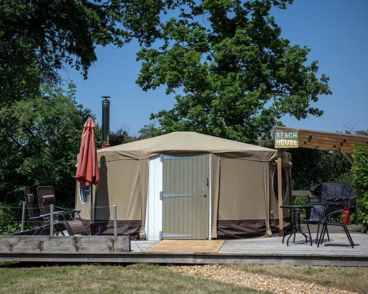 outside of the yurt at back of beyond glamping in dorset