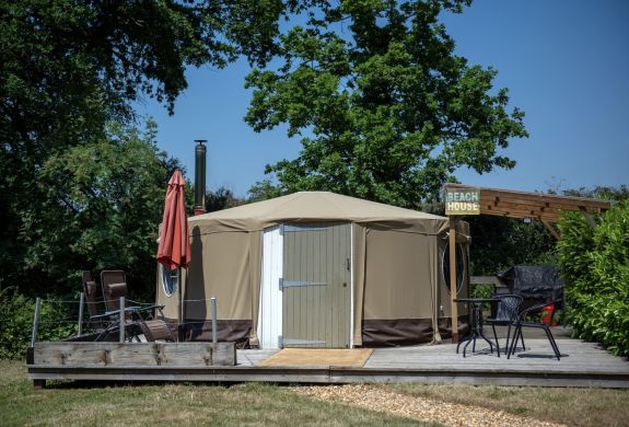 outside of the yurt at back of beyond glamping in dorset