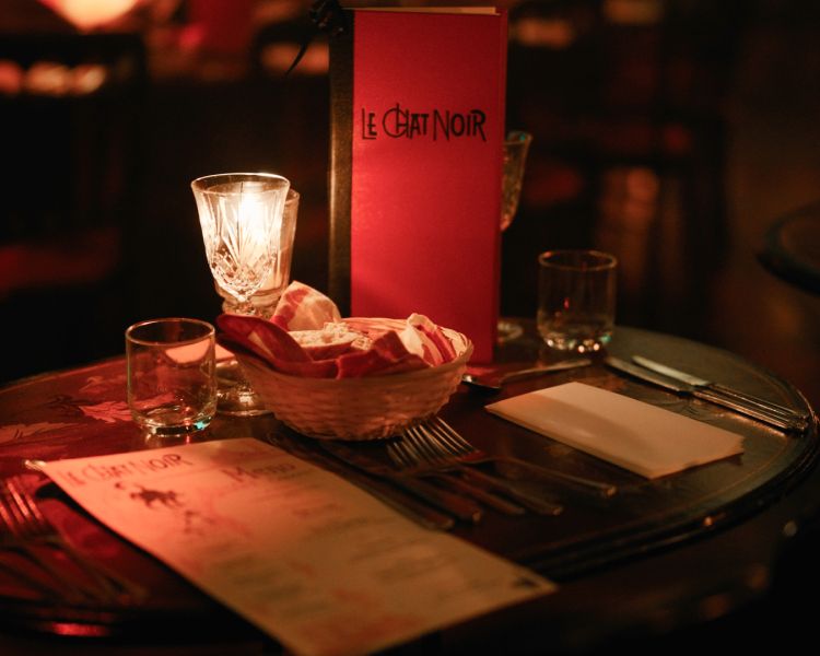 the cabaret seating at the chat noir immersive show and dining experience