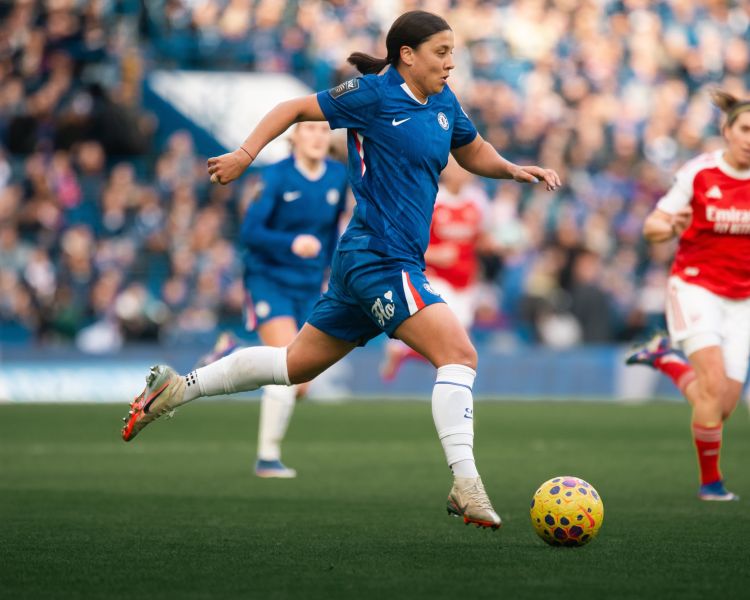 Chelsea women footbal player with ball during match at stamford bridge