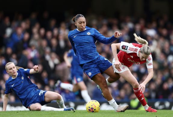 Chelsea player lauren james tackling on pitch during match at stamford bridge