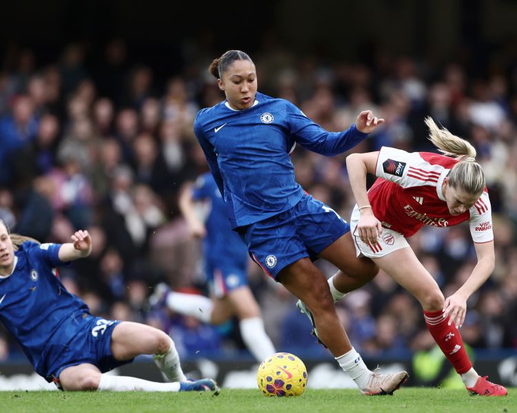 Chelsea player lauren james tackling on pitch during match at stamford bridge