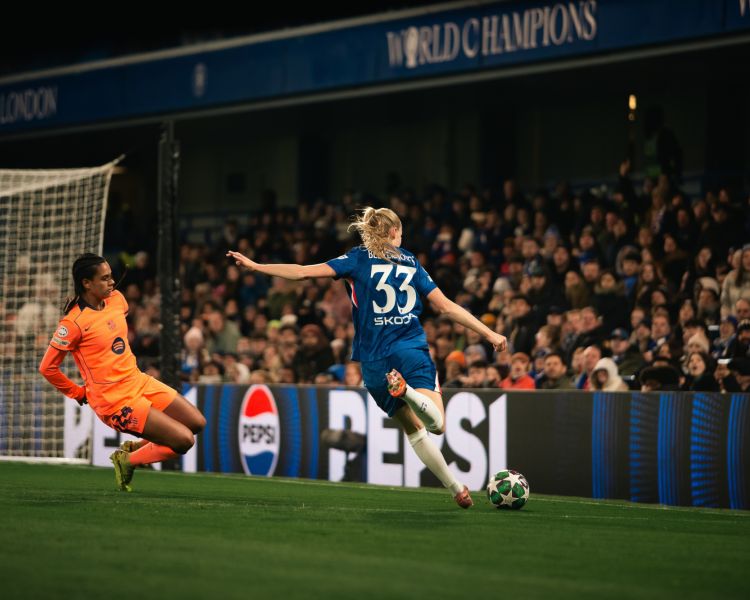 Chelsea player on pitch during game at stamford bridge