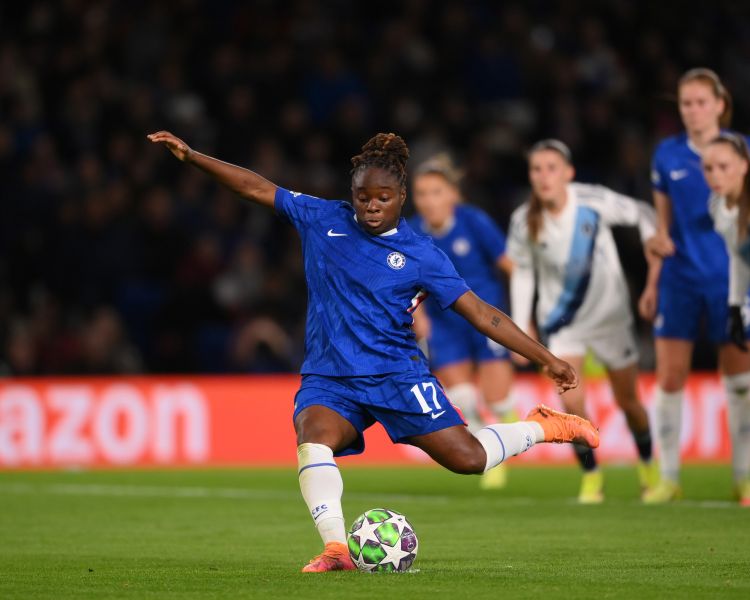 Chelsea women player kicking ball during match at stamford bridge