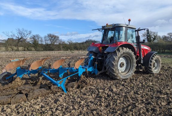 ploughing a field on a tractor driving experience