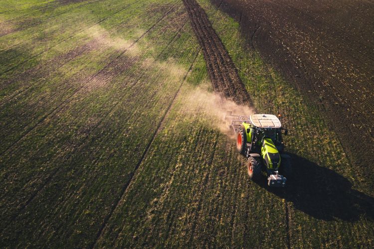 Stock image of a tractor in a field