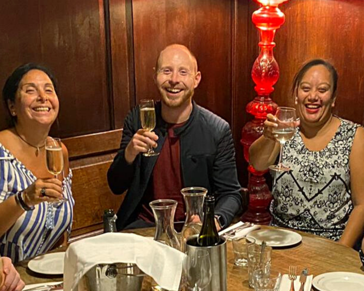 people enjoying champagne on an exotic london east end food tour