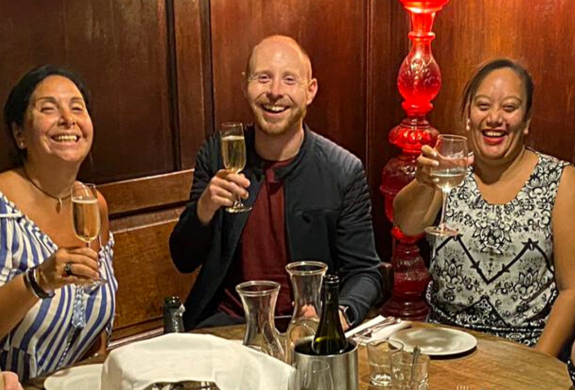 people enjoying champagne on an exotic london east end food tour
