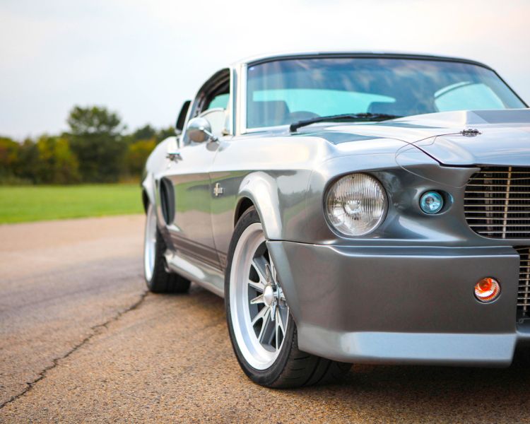 a front corner view of a classic car as part of a driving experience day