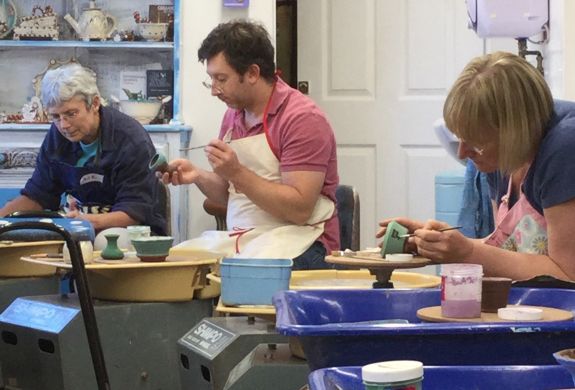 people on a pottery course experience day at eastnor pottery