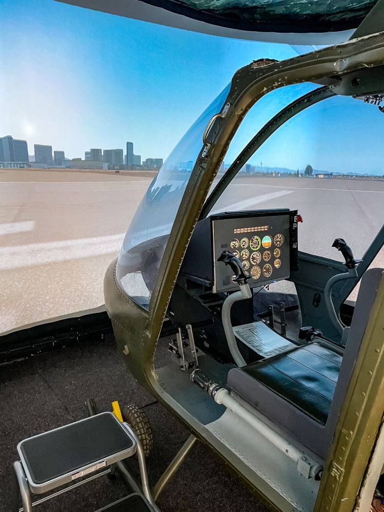 the cockpit of a bell 206 jet ranger helicopter flight simulator