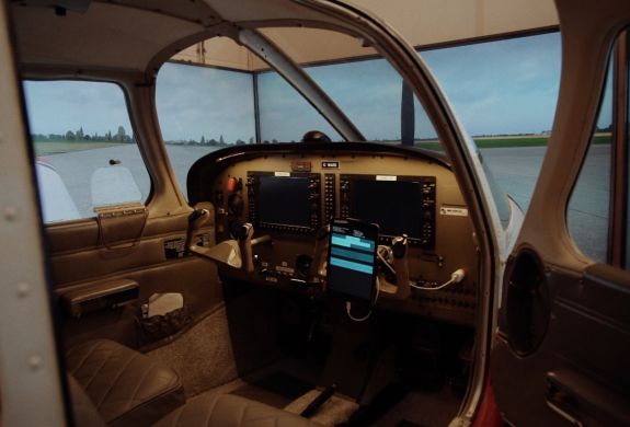the inside of a helicopter flight simulator at deeside flight simulators